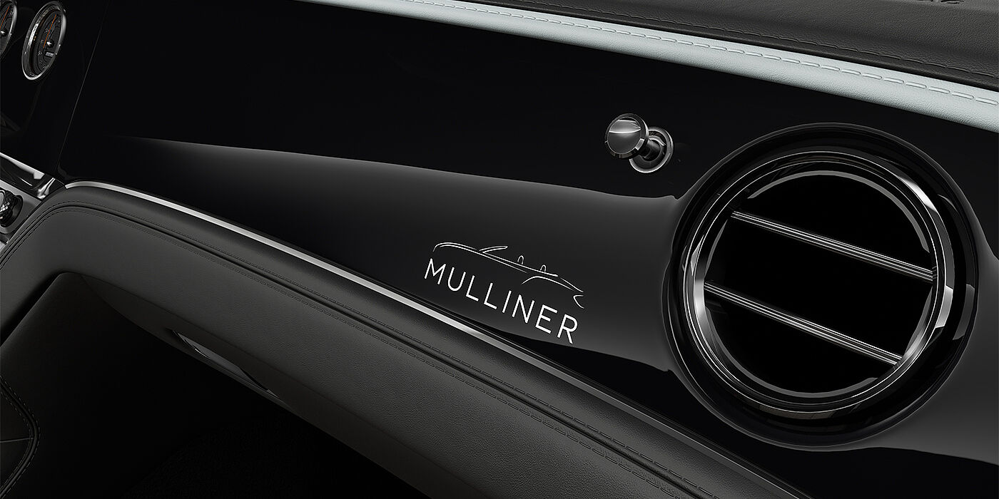 Bentley Köln Bentley Continental GTC Mulliner coupe veneer detail in Grand Black veneer with Diamond Milled console
