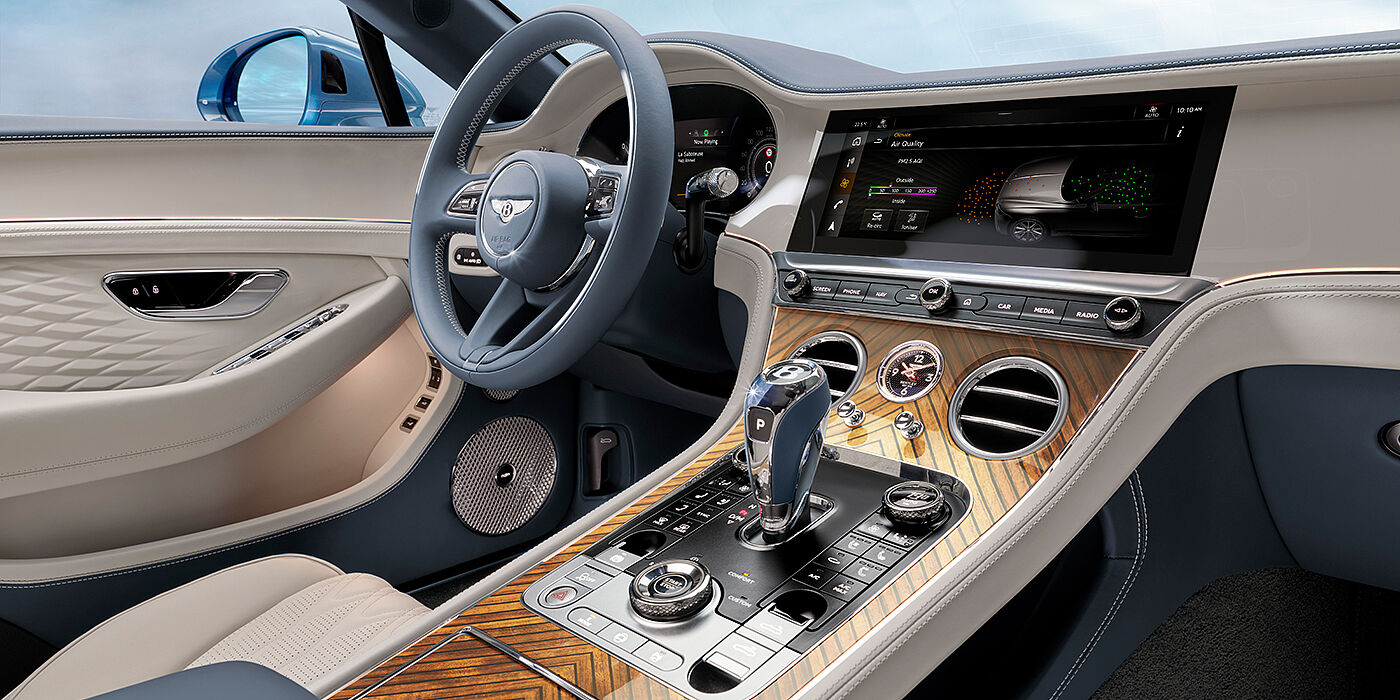 Bentley Köln New Bentley Continental GTC Azure convertible interior front cabin view with Linen and Brunel hides and Piano Linen by Mulliner veneer featuring centre console and centre MMI screen