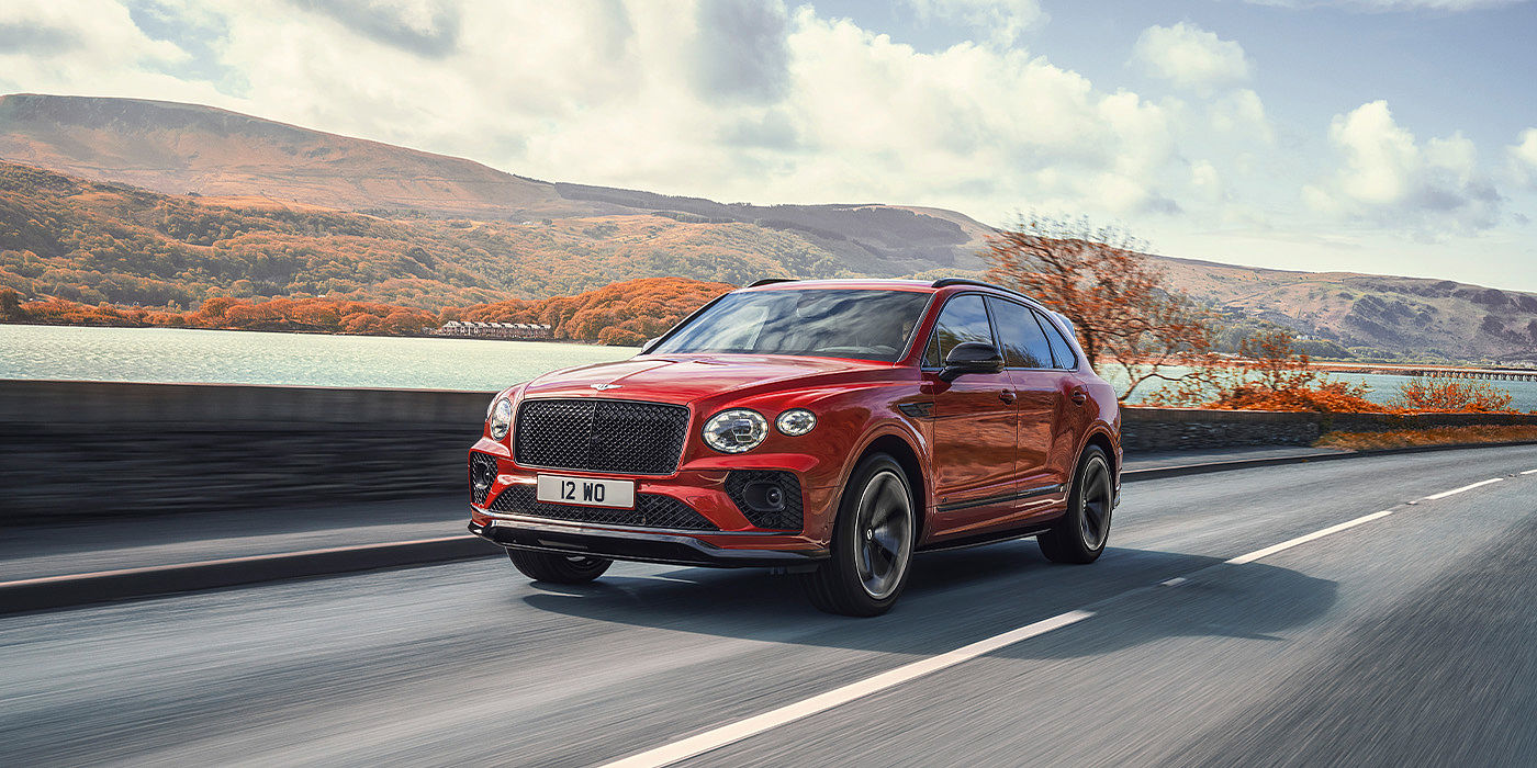 Bentley Köln Bentley Bentayga S SUV in Candy Red paint front 34 dynamic