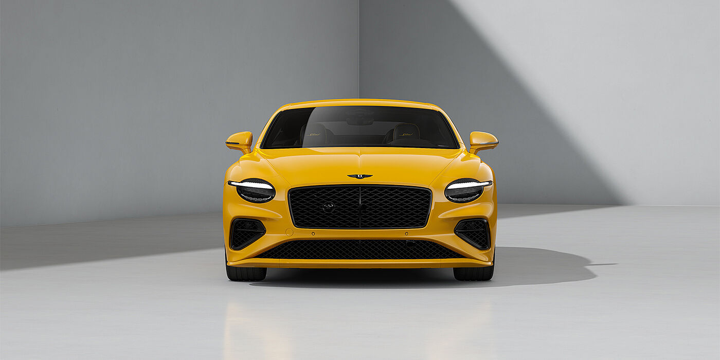 Bentley Köln Bentley Continental GT Speed coupe in Monaco Yellow paint and 22" Ten spoke sport wheels - full front