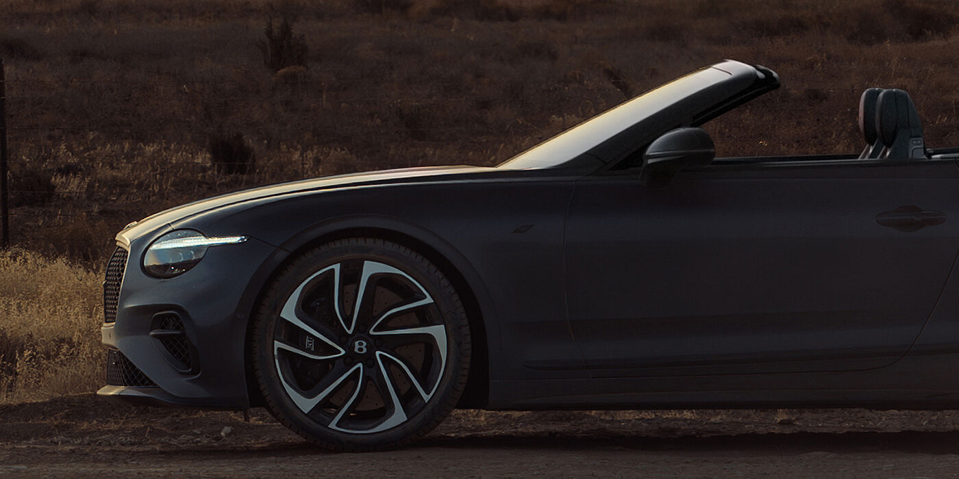 Bentley Köln Bentley Continental GTC S convertible in Thunder blue paint profile at sunset