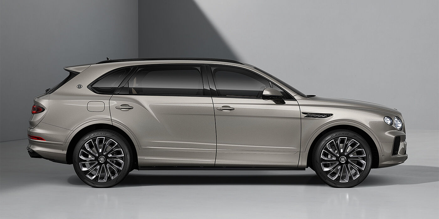 Bentley Köln Bentayga EWB Artenara Edition SUV in Pale Brodgar paint with 22" Mulliner Gloss black wheel profile