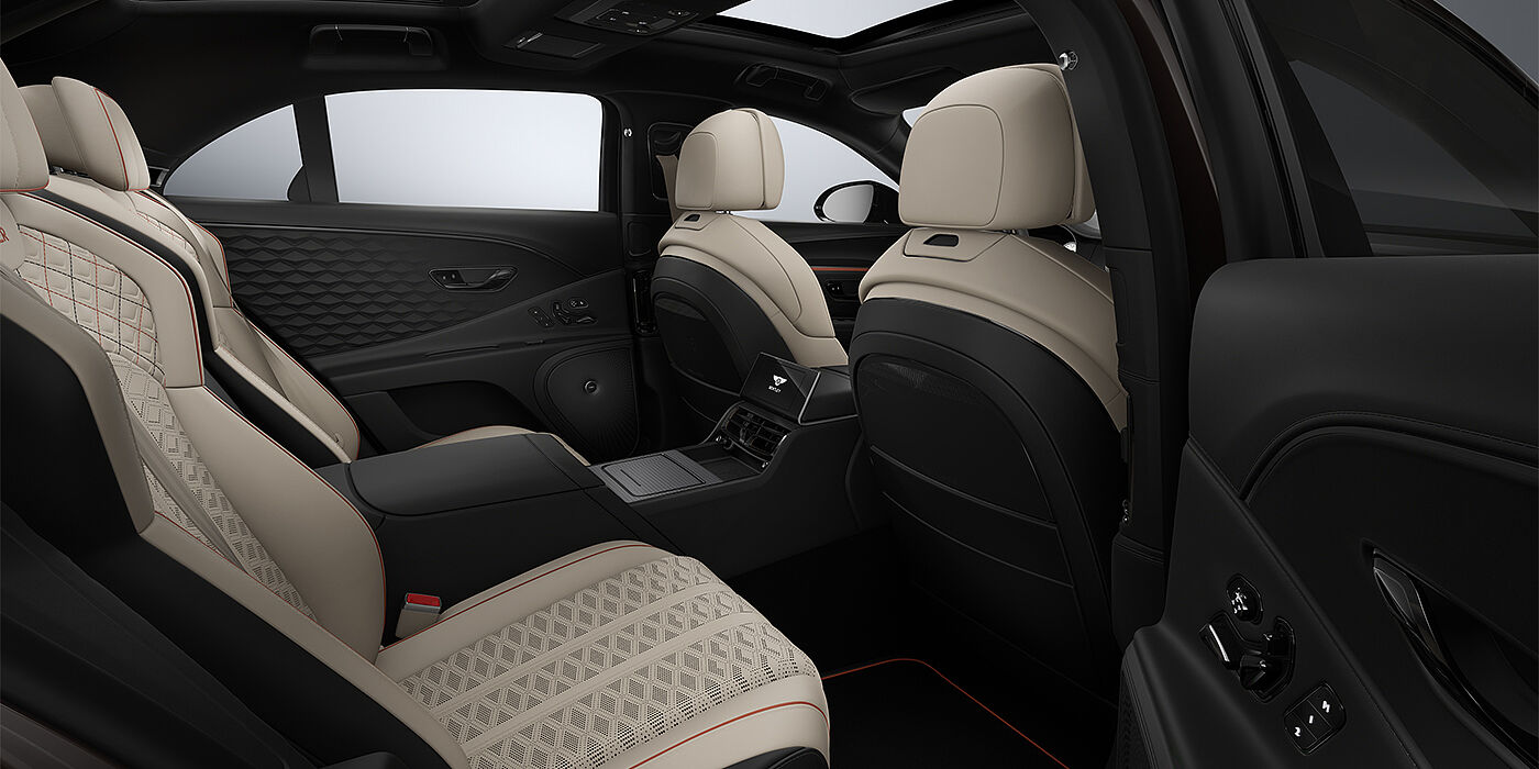 Bentley Köln New Bentley Flying Spur Mulliner sedan rear interior in Portland and Beluga Black hides with Grand Black veneer