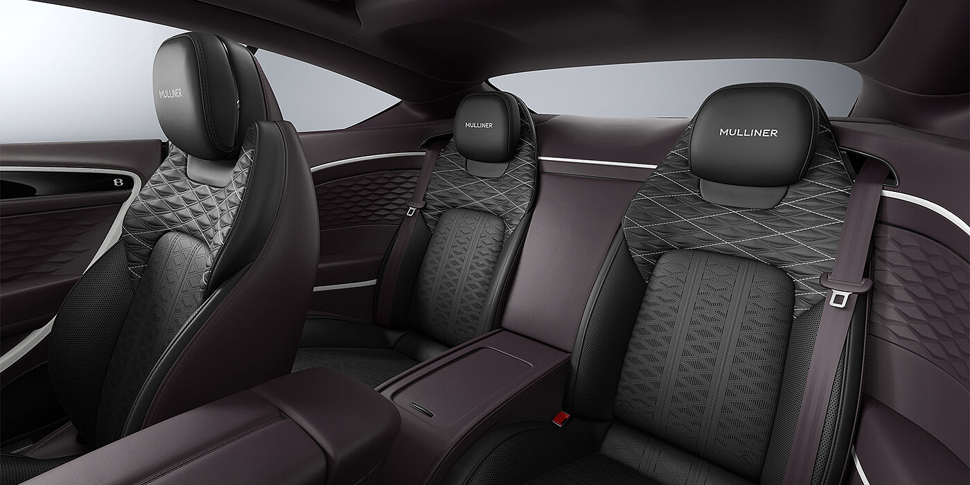 Bentley Köln Bentley Continental GT Mulliner coupe rear interior in Beluga black and Damson hides with white accent hide