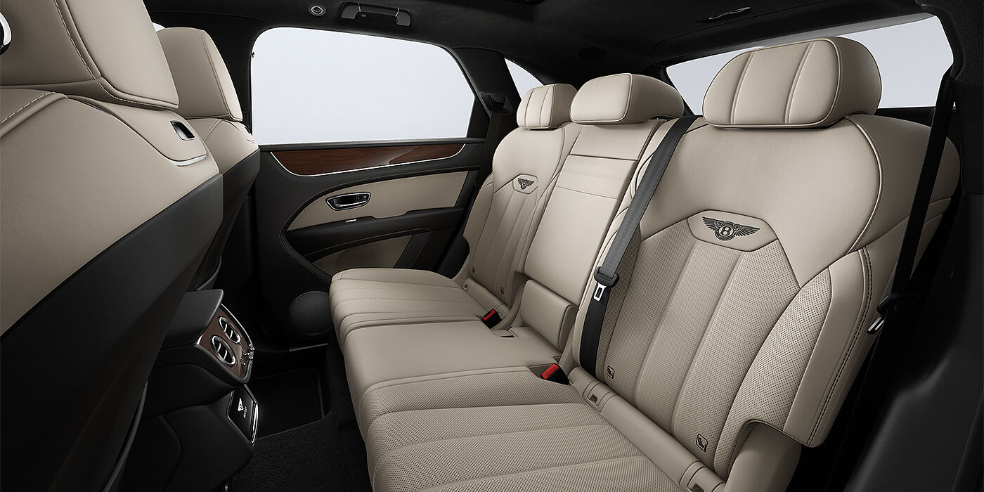 Bentley Köln Bentley Bentayga SUV rear interior in Portland and Beluga black hides