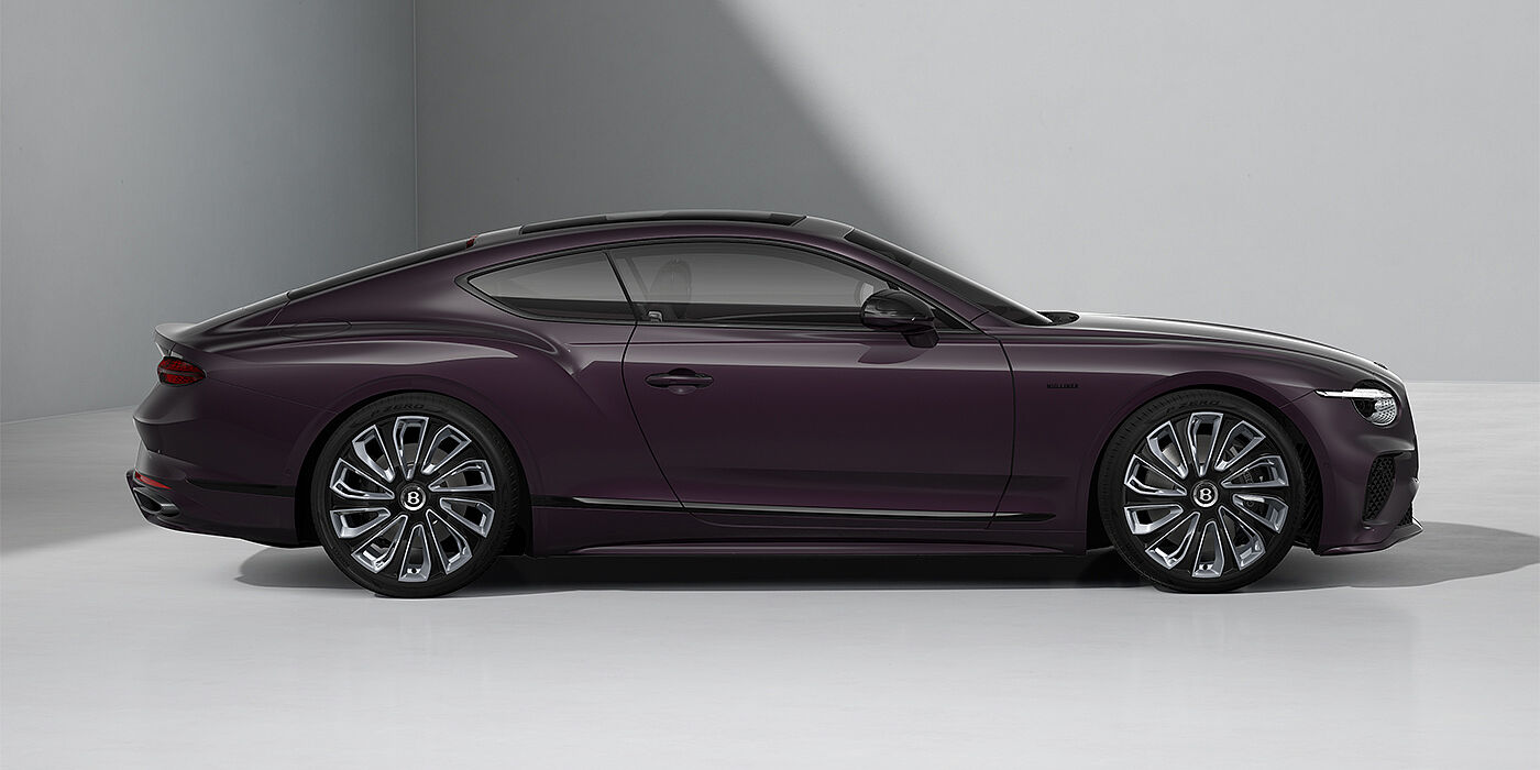 Bentley Köln Bentley Continental GT Mulliner coupe in Damson paint and 22" Mulliner wheels - profile 3/4