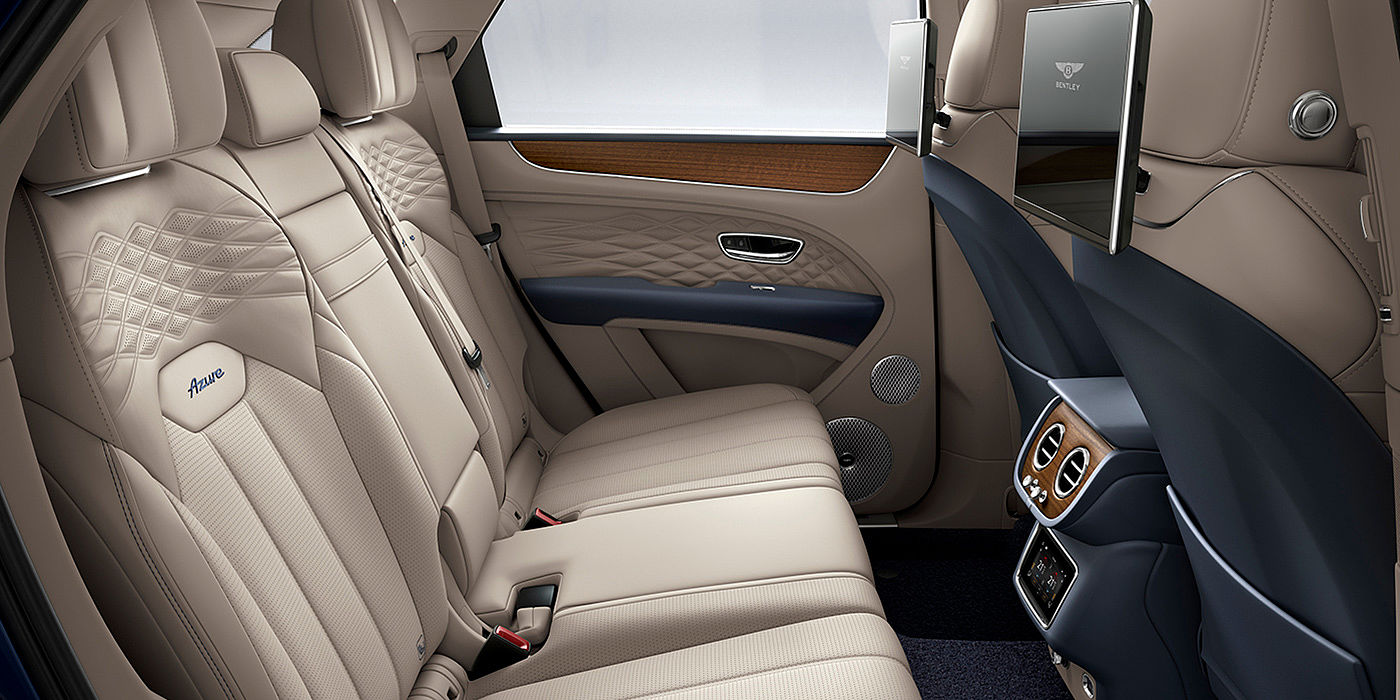 Bentley Köln Bentey Bentayga Azure interior view for rear passengers with Portland hide and Rear Seat Entertainment. 