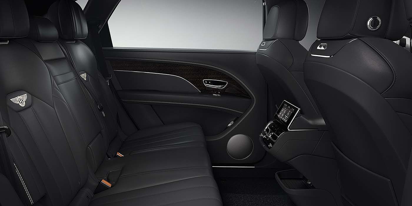 Bentley Köln Bentley Bentayga EWB SUV rear interior in Beluga black leather