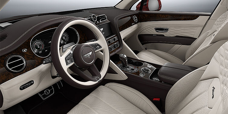 Bentley Köln Bentley Bentayga EWB Azure SUV front interior in Linen and Burnt Oak hides with Dark Stained Burr Walnut veneer