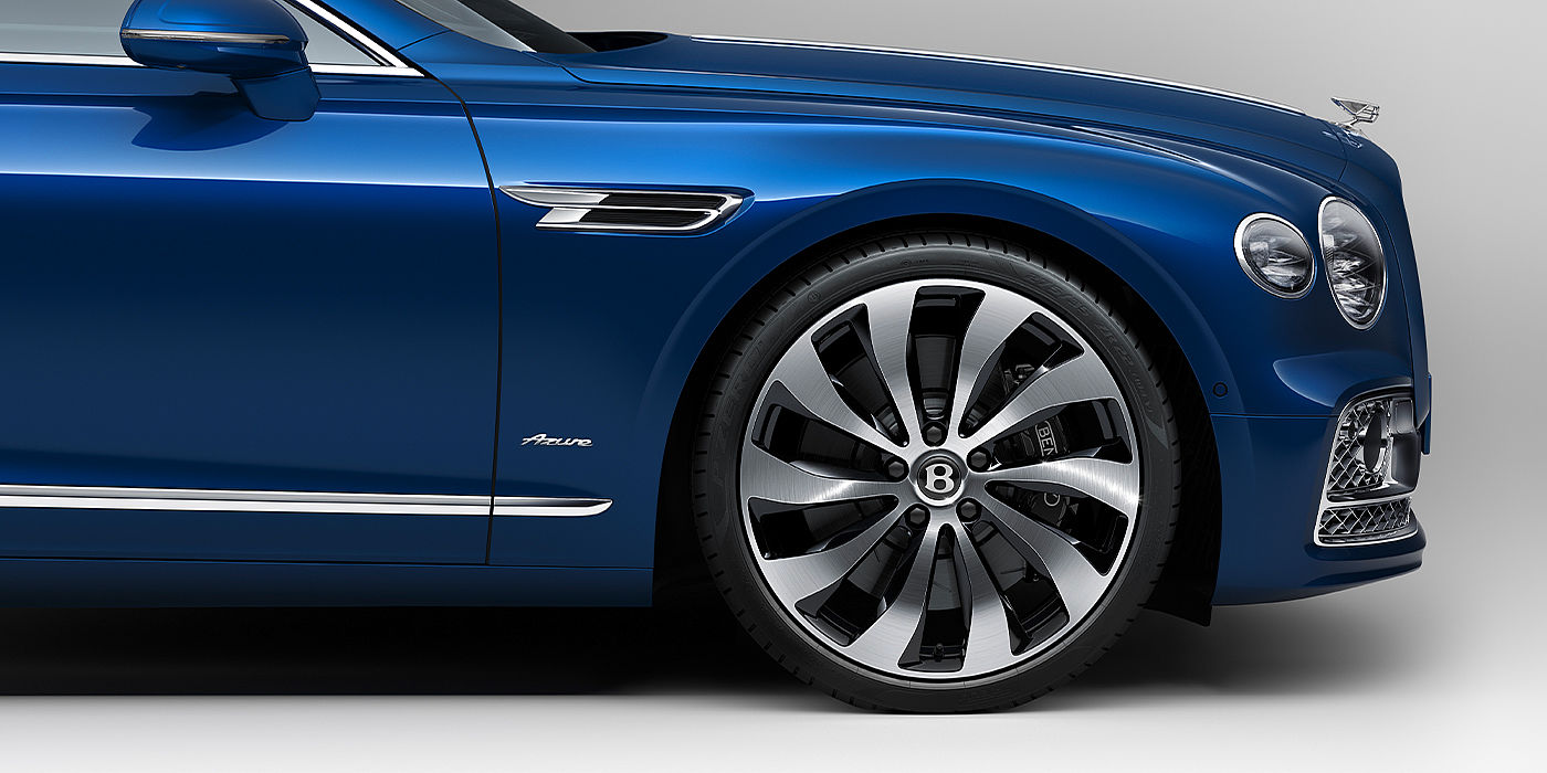 Bentley Köln Bentley Flying Spur Azure sedan side close up in Sequin Blue paint with Azure badge
