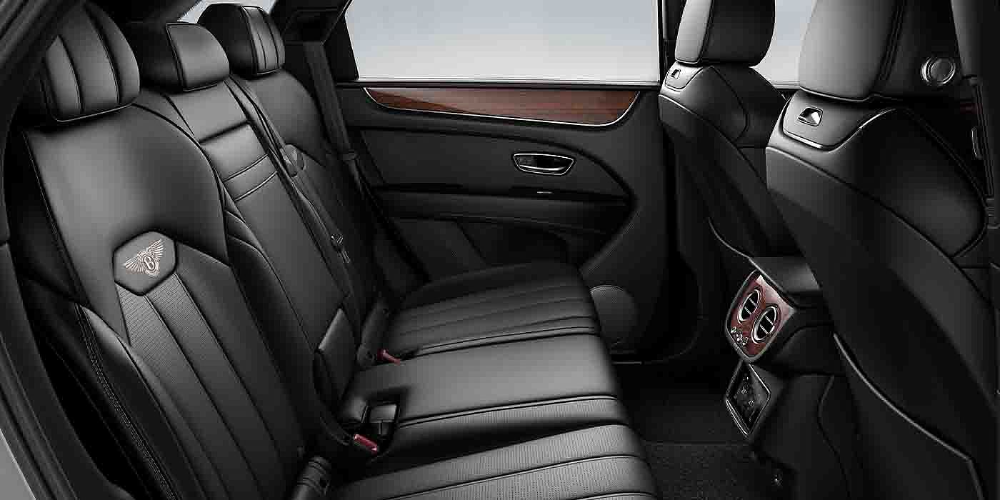 Bentley Köln Bentley Bentayga EWB interior view for rear passengers with Beluga black hide.
