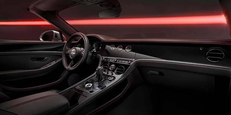 Bentley Köln Bentley Continental GTC Black Edition convertible front interior with Beluga black hide and High Gloss Carbon Fibre veneer