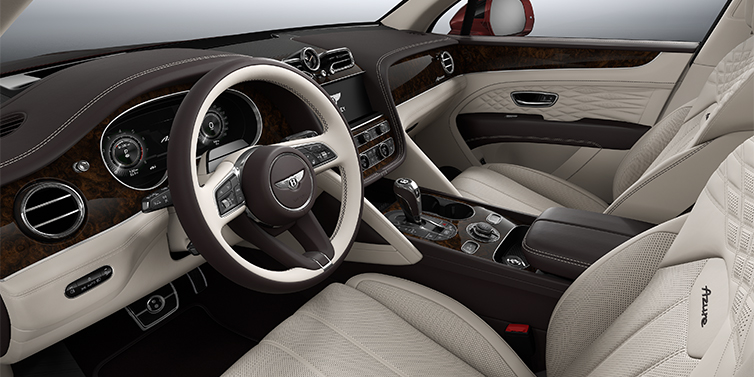 Bentley Köln Bentley Bentayga EWB Azure SUV front interior in Linen and Burnt Oak hides with Dark Stained Burr Walnut veneer
