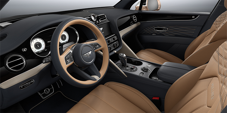 Bentley Köln Bentley Bentayga EWB Mulliner SUV front interior in Camel and Brunel hides with Grand Black veneer and Aluminium console