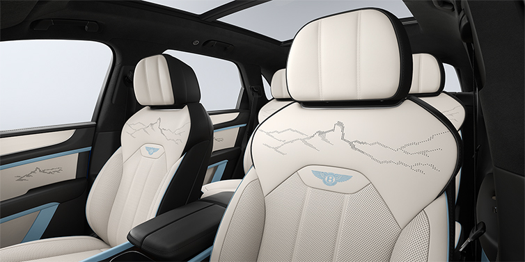 Bentley Köln Bentley Bentayga Artenara Edition SUV front seats in Linen and Beluga Black hides with Light Blue accents and Artenara stitch detail