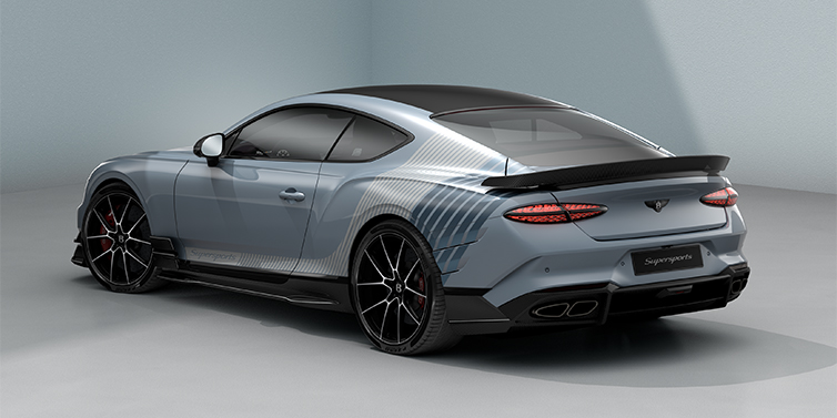 Bentley Köln Bentley Supersports rear three quarter in "Daybreak" Design theme with Jetstream blue paint and Arctica white and Portofino blue paint stripes across the rear haunch.