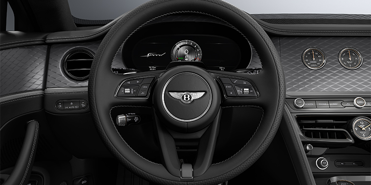 Bentley Köln New Bentley Flying Spur Speed sedan steering wheel and dash in Gravity Grey and Beluga black hides and Diamond Brushed Dark Tint Aluminium veneer